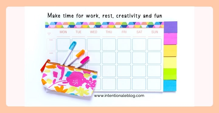 image of a puch with pens and a blank calendar