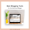 Featured Image of a the blog post with a title Best Blogging tools for the intentional blogger, a yellow vase on the left with a green plant, with a gold macbook on it's right