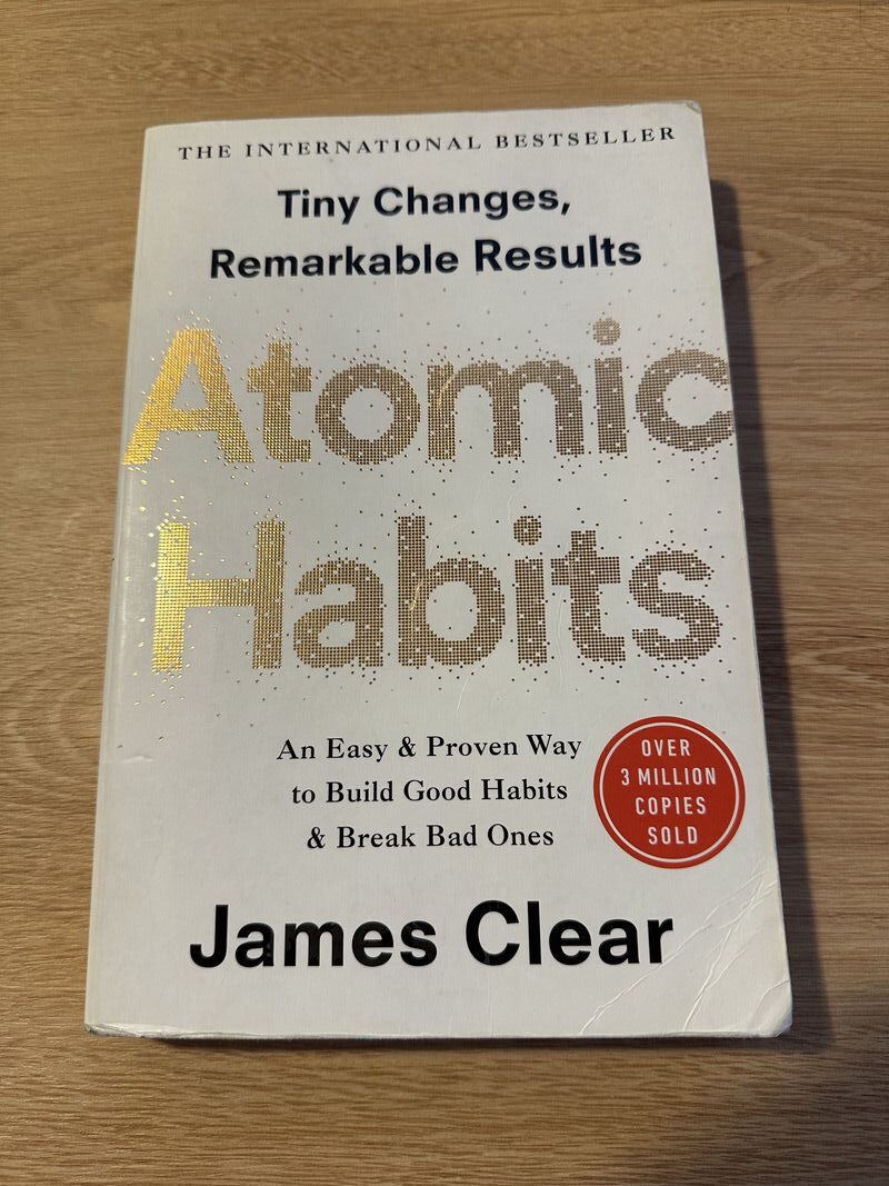 image of a book title atomic habits 